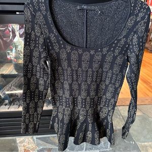 Rvn couture round neck sweater peplum style